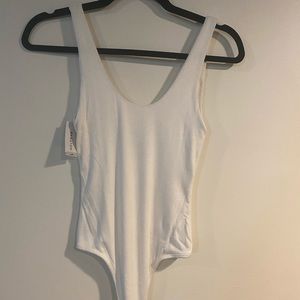 Aritzia White Ribbed Bodysuit (never worn)